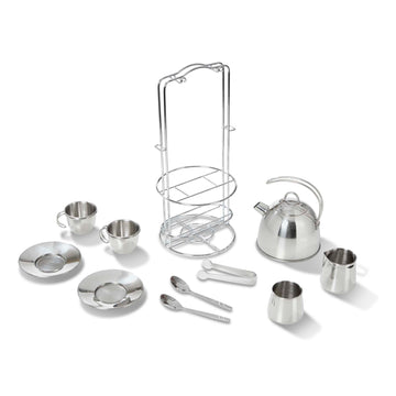 Stainless steel tea set with kettle, cups, saucers, and other utensils on a white background
