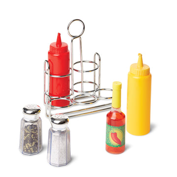 Ketchup, mustard, hot sauce, and salt and pepper shakers on a white background