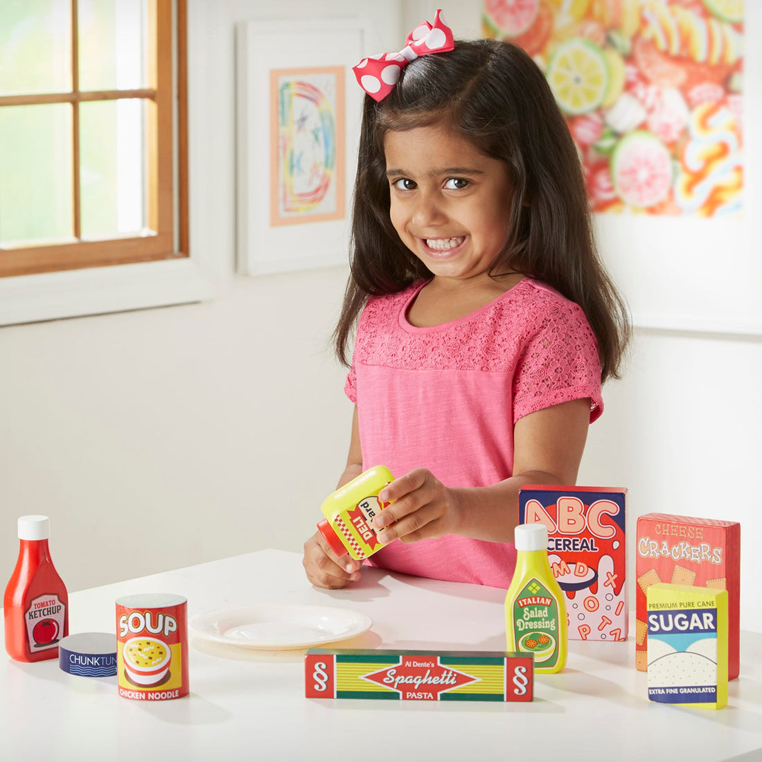 Collection of toy food packages on a white background