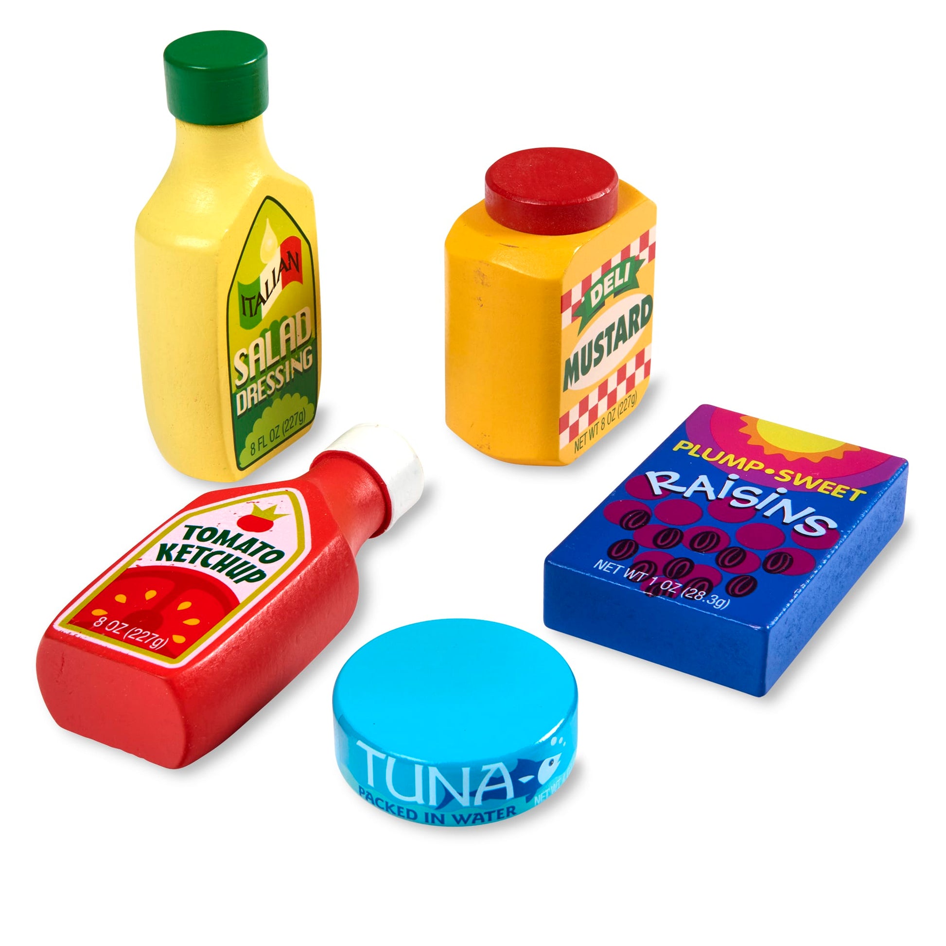 Set of toy food items including a bottle of salad dressing, mustard, ketchup, tuna, and raisins on a white background.
