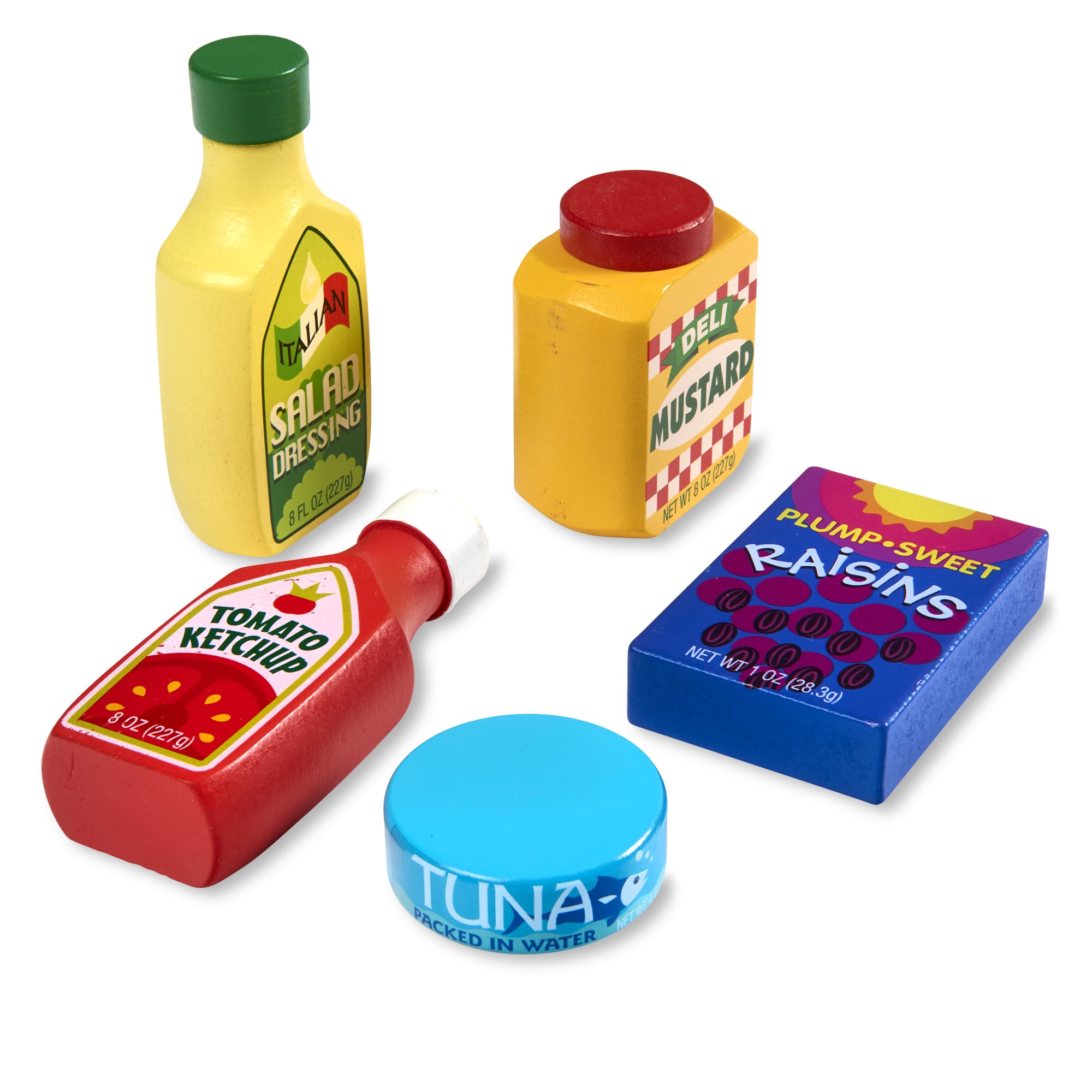 Set of toy food items including a bottle of salad dressing, mustard, ketchup, tuna, and raisins on a white background.