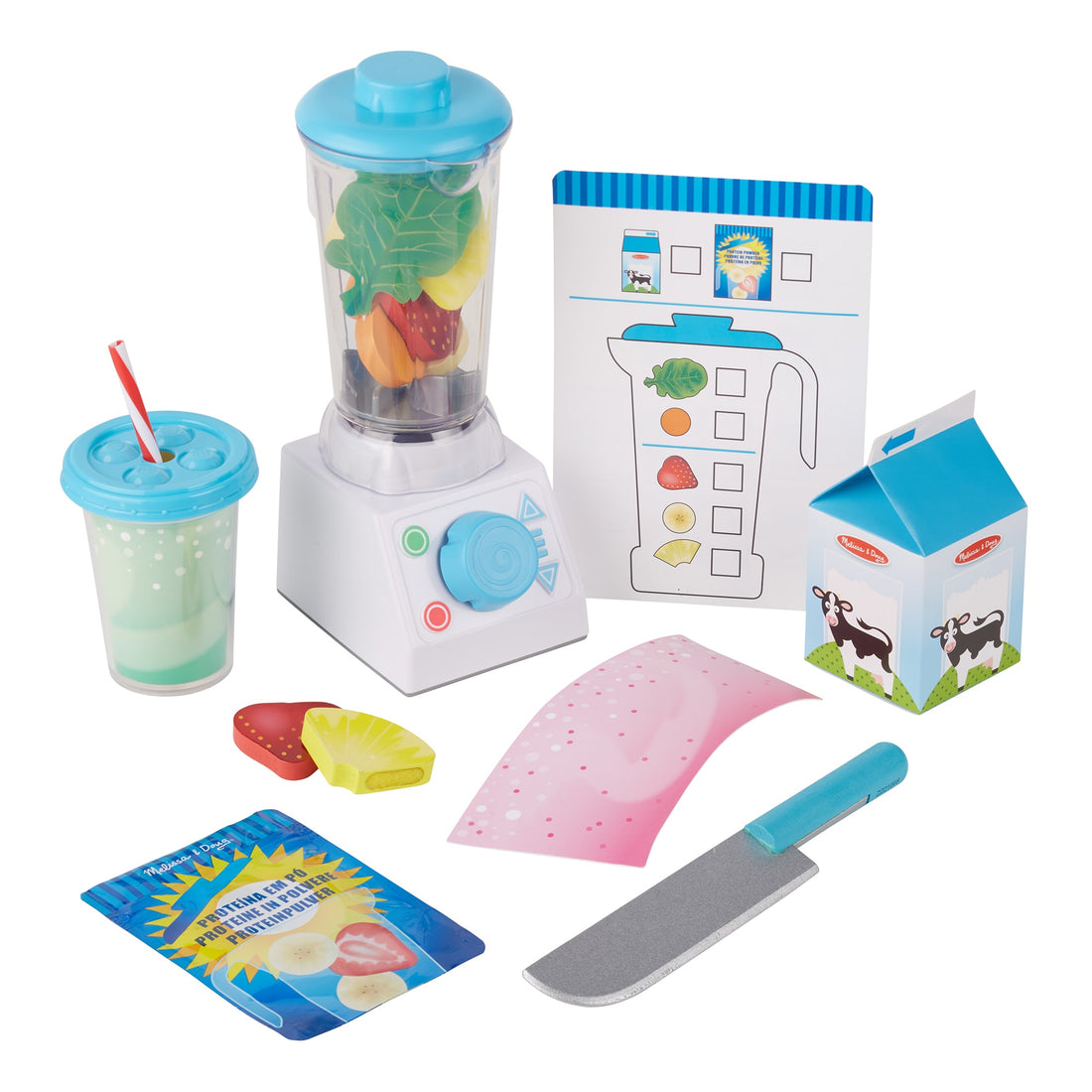Child playing with toy blender and food items on a table