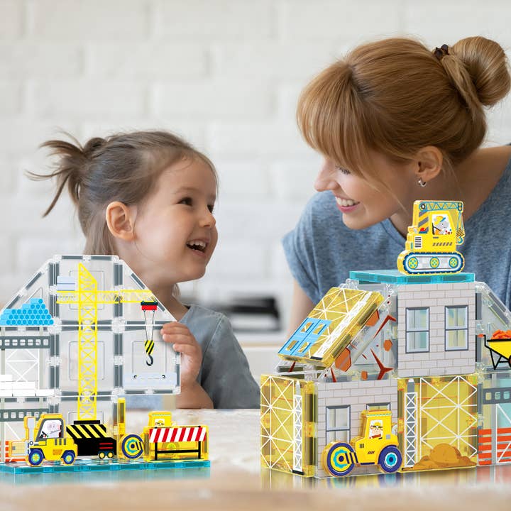 Kids playing with PicassoTiles Magnet Tile Building Block Set with 8 Construction Vehicles Crank Truck, Excavator, Bulldozer, Road Roller, Concrete Mixer, Tractor, Dump Truck, &amp; Forklift Magnetic Toy