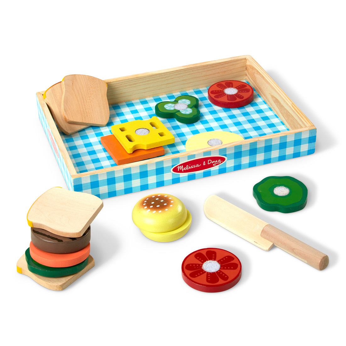 Wooden toy kitchen set with colorful components on a checkered tray, featuring the Melissa & Doug logo.