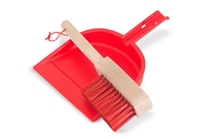 Red dustpan and brush set on a white background